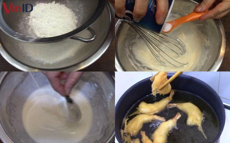 Nhúng tôm qua lớp bột để chuẩn bị chiên